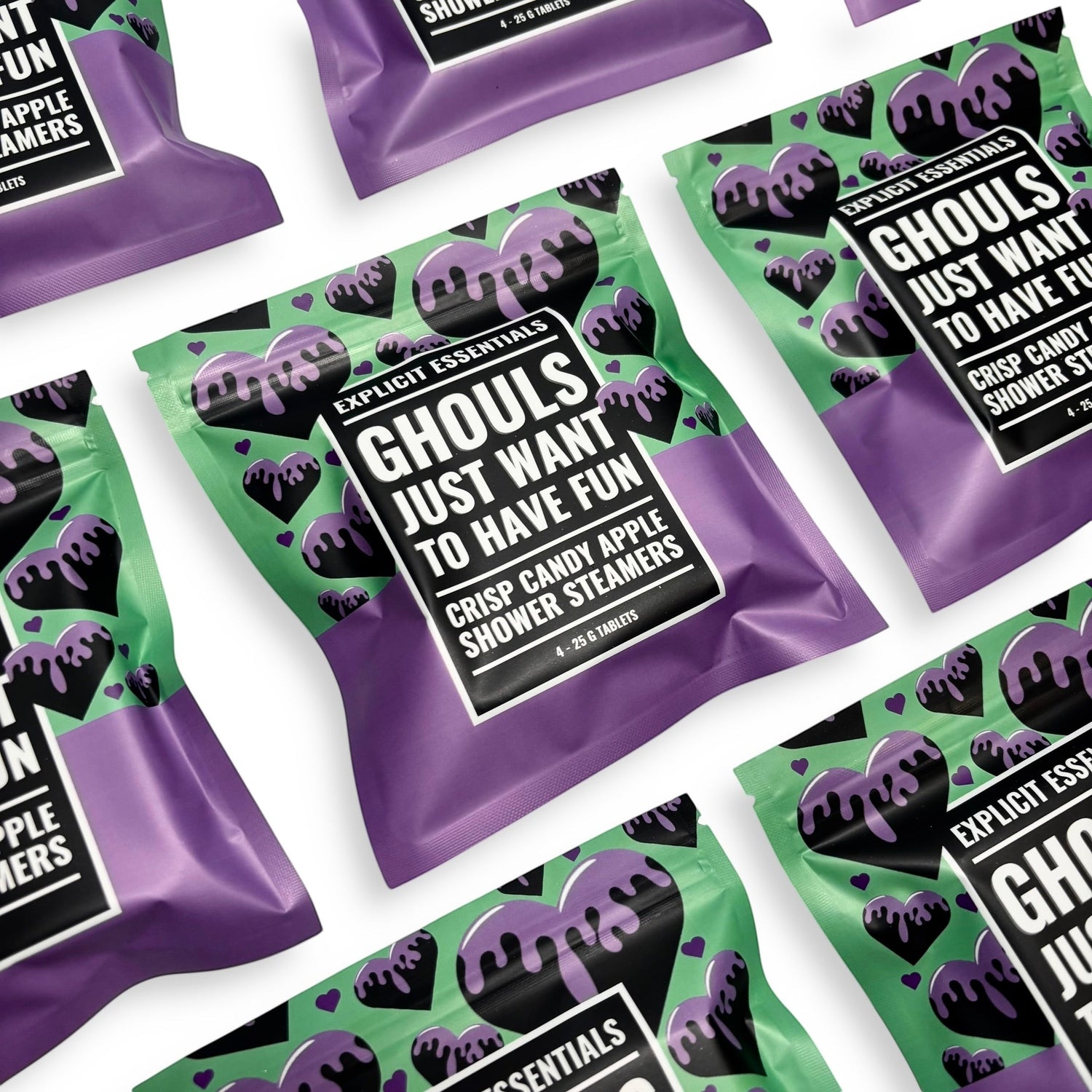 Explicit Essentials Ghouls Just Want To Have Fun crisp candy apple shower steamers, 4-25g tablets, with dripping heart design.